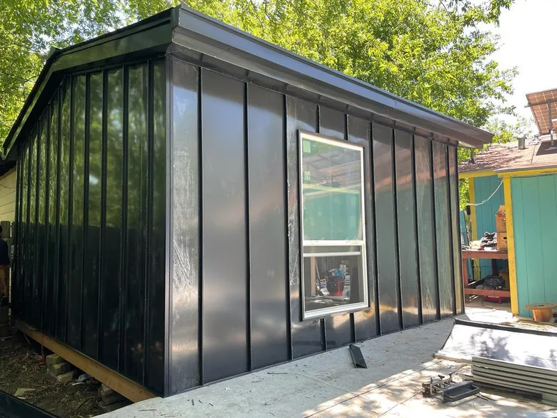 Black standing seam metal wall panels for Roof Inspection in Woburn