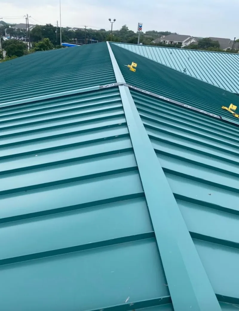 Green commercial metal roof ridge and valley for Metal Roof Repair in Woburn