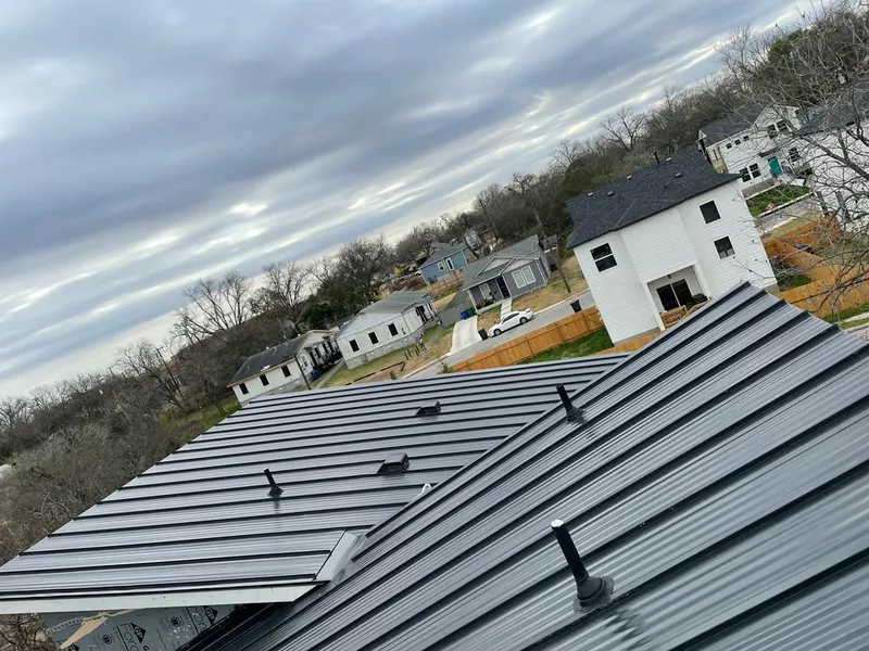 Standing seam metal roof panels with vents for Skylight Repair in Woburn